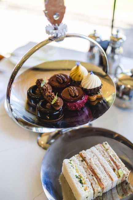 Fonab Castle | Cakes on cake stand and sandwiches during afternoon tea at luxury spa hotel in Scotland ?? Fonab Castle